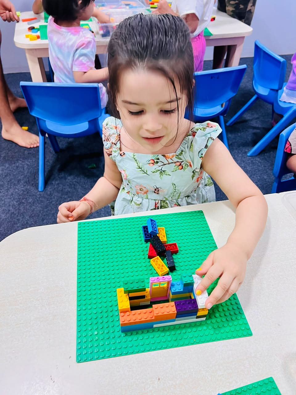 Hands-on Montessori numeracy and counting beads activity at Damara International preschool