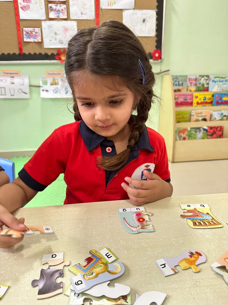 Young learners building architectural structures in modern AC classroom at Damara Pune