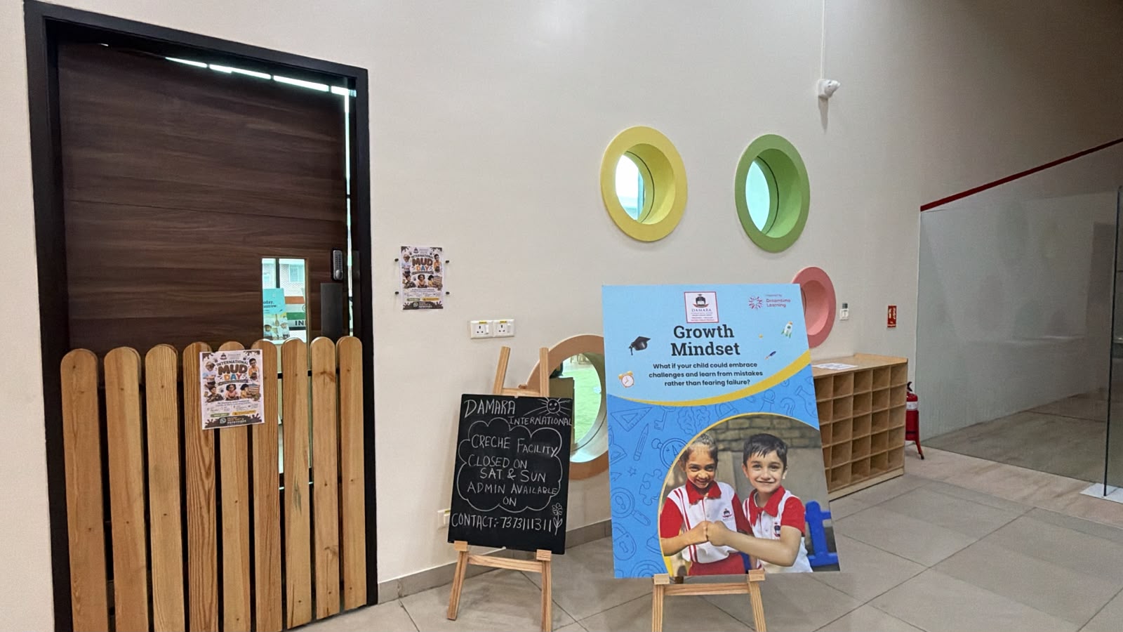 Preschool group reading and picture book session with teacher in cozy library corner Pune